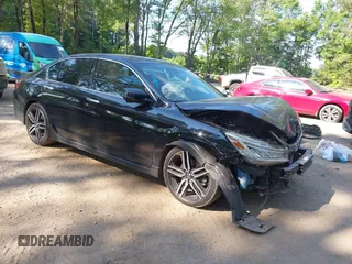 2017 Honda Accord Touring z VIN 1HGCR3F97HA044885, wystawiony jako IAAI lot #42603354 z przebiegiem 175 110 mil mil oraz . Historia ofert i sprzedaży dostępna na DreamBid. Obrazek 1.