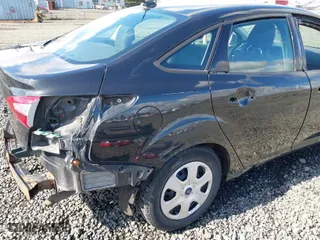 2014 Ford Focus S with VIN 1FADP3E29EL176811, listed as a IAAI auction lot 41808719 with 84,600 mi miles. Bid and sale history available at carsss.com. Image 19.