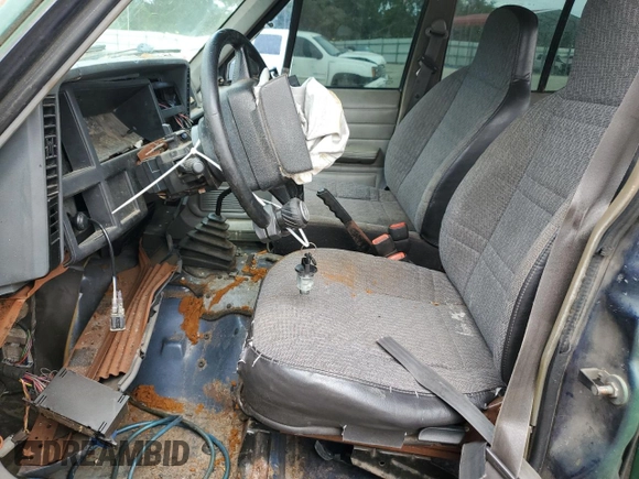 1996 Jeep Cherokee SE with VIN 1J4FT28S5TL244548, listed as a Copart auction lot 68908934 with 182,507 mi miles and Salvage Title. Bid and sale history available at carsss.com. Image 7.