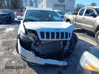 2021 Jeep Cherokee Limited z VIN 1C4PJMDX7MD148011, wystawiony jako IAAI lot #41494706 z przebiegiem 66 108 mil mil oraz . Historia ofert i sprzedaży dostępna na DreamBid. Obrazek 12.