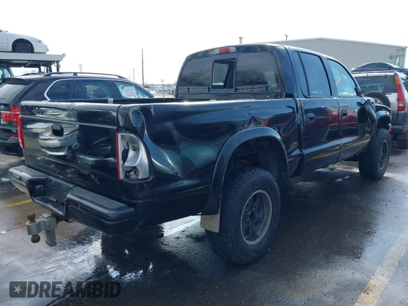 2002 Dodge Dakota Sport with VIN 1B7HG38N32S641652, listed as a IAAI auction lot 41621233 with 250,148 mi miles. Bid and sale history available at carsss.com. Image 4.