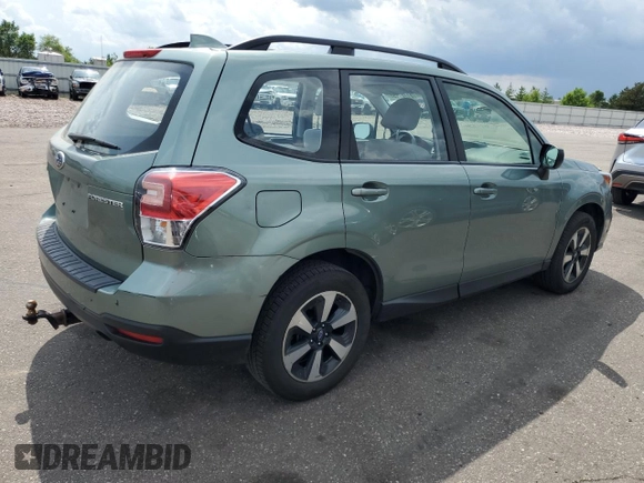 2018 Subaru Forester with VIN JF2SJABC1JH582343, listed as a Copart auction lot 61181195 with 82,904 mi miles and Salvage title. Bid and sale history available at DreamBid. Image 3.