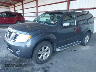 2011 Nissan Pathfinder LE z VIN 5N1AR1NB1BC616913, wystawiony jako IAAI lot #40627326 z przebiegiem 119 372 mil mil oraz . Historia ofert i sprzedaży dostępna na DreamBid. Obrazek 2.