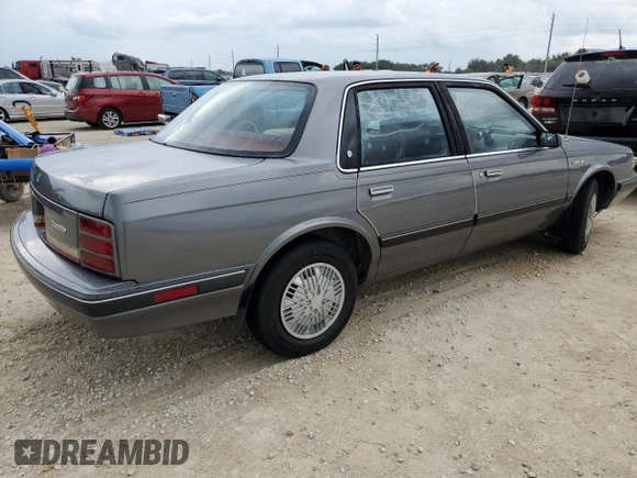 1992 Oldsmobile Cutlass z VIN 1G3AL54N4N6438104, wystawiony jako Copart lot #74415204 z przebiegiem 118 459 mil mil oraz Szkody całkowita. Historia ofert i sprzedaży dostępna na DreamBid. Obrazek 3.