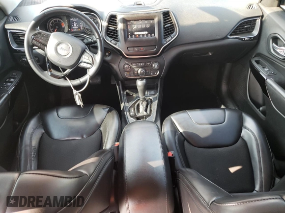 2019 Jeep Cherokee Altitude with VIN 1C4PJLLB2KD392971, listed as a Copart auction lot 59190355 with 163,471 mi miles and Salvage title. Bid and sale history available at DreamBid. Image 8.