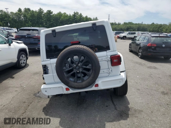 2021 Jeep Wrangler Unlimited Sahara Altitude with VIN 1C4HJXEG1MW586273, listed as a Copart auction lot 61723485 with 76,236 mi miles and Salvage title. Bid and sale history available at DreamBid. Image 6.
