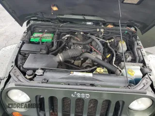 2007 Jeep Wrangler Unlimited Sahara z VIN 1J4GA59127L106988, wystawiony jako Copart lot #59750975 z przebiegiem 154 233 mil mil oraz Czysty tytuł • Clean title. Historia ofert i sprzedaży dostępna na DreamBid. Obrazek 11.