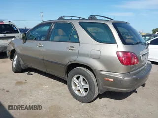 1999 Lexus RX 300 with VIN JT6HF10U6X0092078, listed as a IAAI auction lot 41988259 with 144,148 mi miles and . Bid and sale history available at DreamBid. Image 3.