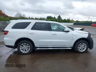 2015 Dodge Durango SXT with VIN 1C4RDJAG8FC239977, listed as a IAAI auction lot 40764725 with 133,809 mi miles and . Bid and sale history available at carsss.com. Image 14.