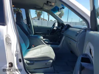2004 Honda Pilot EX with VIN 2HKYF18424H564482, listed as a IAAI auction lot 41868124 with 173,484 mi miles. Bid and sale history available at carsss.com. Image 5.