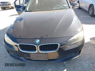 2015 BMW 3 Series 328i with VIN WBA3A5C55FF608159, listed as a IAAI auction lot 41255978 with 199,024 mi miles. Bid and sale history available at carsss.com. Image 6.