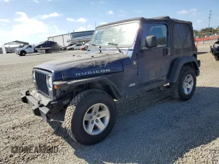 2005 Jeep Wrangler Rubicon with VIN 1J4FA69S05P351725, listed as a Copart auction lot 71411904 with 144,557 mi miles and Salvage Title. Bid and sale history available at carsss.com. Image 1.