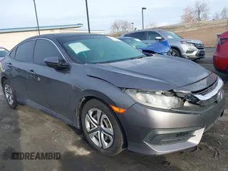 2017 Honda Civic Sedan LX with VIN 19XFC2F59HE204377, listed as a IAAI auction lot 41706604 with 160,114 mi miles. Bid and sale history available at carsss.com. Image 1.