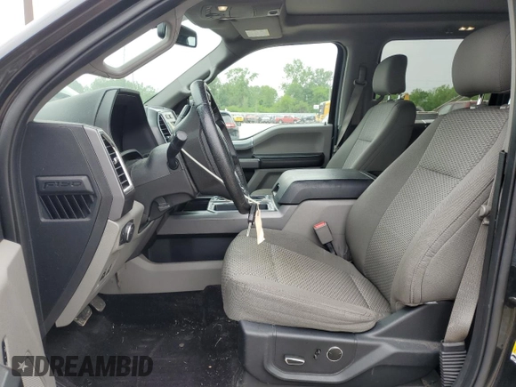 2015 Ford F-150 XLT with VIN 1FTEW1EP7FFC21309, listed as a Copart auction lot 55979265 with 86,484 mi miles and Salvage title. Bid and sale history available at DreamBid. Image 7.