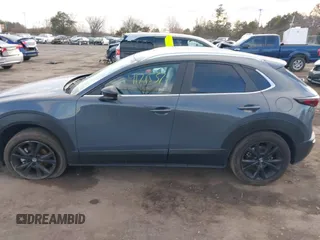2023 Mazda CX-30 S Carbon Edition with VIN 3MVDMBCM1PM573317, listed as a IAAI auction lot 41785371 with 6,475 mi miles and . Bid and sale history available at DreamBid. Image 14.