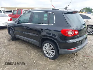 2011 Volkswagen Tiguan SEL with VIN WVGBV7AX6BW521525, listed as a IAAI auction lot 42490216 with 123,546 mi miles and . Bid and sale history available at DreamBid. Image 3.
