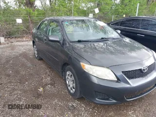 2009 Toyota Corolla with VIN JTDBL40E799040751, listed as a IAAI auction lot 42046821 with 199,634 mi miles. Bid and sale history available at carsss.com. Image 1.