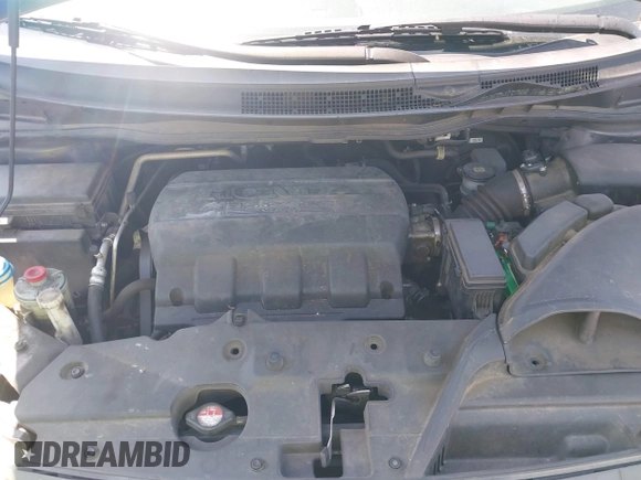 2013 Honda Odyssey EX-L with VIN 5FNRL5H65DB011071, listed as a IAAI auction lot 41992265 with 192,624 mi miles and . Bid and sale history available at DreamBid. Image 10.