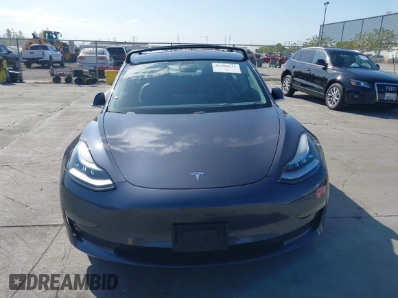 2018 Tesla Model 3 Long Range Battery with VIN 5YJ3E1EA4JF024102, listed as a IAAI auction lot 42100621 with 86,298 mi miles and . Bid and sale history available at DreamBid. Image 11.