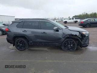 2024 Toyota RAV4 Hybrid SE with VIN 2T3T6RFV0RW055852, listed as a IAAI auction lot 41804088 with 36,428 mi miles and . Bid and sale history available at DreamBid. Image 14.