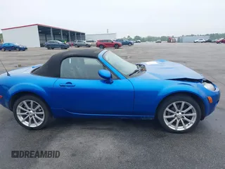 2006 Mazda MX-5 Miata Touring z VIN JM1NC25FX60102209, wystawiony jako IAAI lot #41940771 z przebiegiem 165 003 mil mil oraz . Historia ofert i sprzedaży dostępna na DreamBid. Obrazek 12.