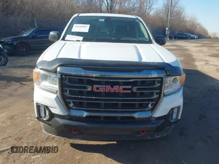 2021 GMC Canyon 4WD AT4 w/Leather with VIN 1GTG6FEN0M1279289, listed as a IAAI auction lot 41620801 with 134,699 mi miles. Bid and sale history available at carsss.com. Image 6.