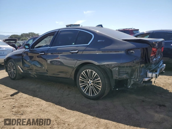 2018 BMW 5 Series 530e with VIN WBAJA9C52JB249402, listed as a Copart auction lot 55093055 with 117,033 mi miles and Salvage title. Bid and sale history available at DreamBid. Image 2.