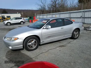 2001 Pontiac Grand Prix GT with VIN 1G2WP12K71F159353, listed as a Copart auction lot 43827005 with 184,896 mi miles and Salvage Title. Bid and sale history available at carsss.com. Image 1.