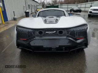 2023 McLaren Artura z VIN SBM16AEA4PW001953, wystawiony jako Copart lot #88790405 z przebiegiem 6864 mil mil oraz Nie do naprawy. Historia ofert i sprzedaży dostępna na DreamBid. Obrazek 6.