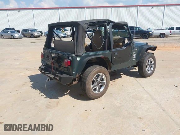 2002 Jeep Wrangler Sport with VIN 1J4FA49S52P760173, listed as a IAAI auction lot 42468550 with 201,682 mi miles and . Bid and sale history available at DreamBid. Image 4.