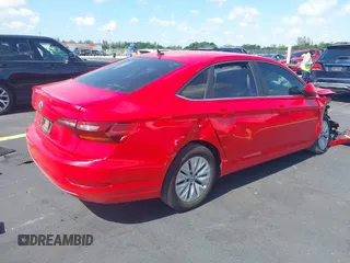 2019 Volkswagen Jetta S z VIN 3VWC57BUXKM029610, wystawiony jako IAAI lot #42334649 z przebiegiem 34 072 mil mil oraz . Historia ofert i sprzedaży dostępna na DreamBid. Obrazek 4.