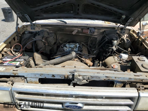 1987 Ford F-150 с VIN 1FTEF14H2HKB06296, выставлен на аукционе Copart как лот 57914035 с пробегом 40 931 миль миль и Чистый • Clean title. История ставок и продаж доступна на DreamBid. Изображение 11.