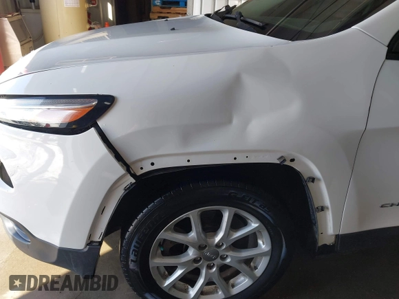 2016 Jeep Cherokee Sport z VIN 1C4PJLAB2GW291282, wystawiony jako IAAI lot #41579554 z przebiegiem 121 590 mil mil oraz . Historia ofert i sprzedaży dostępna na DreamBid. Obrazek 18.