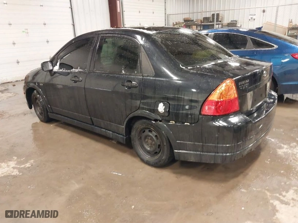 2004 Suzuki Aerio S with VIN JS2RA61S845202185, listed as a IAAI auction lot 41497079 with 96,925 mi miles. Bid and sale history available at carsss.com. Image 3.