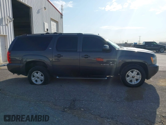 2011 Chevrolet Suburban LT with VIN 1GNSKJE34BR242629, listed as a IAAI auction lot 42043276 with 197,722 mi miles and . Bid and sale history available at DreamBid. Image 13.