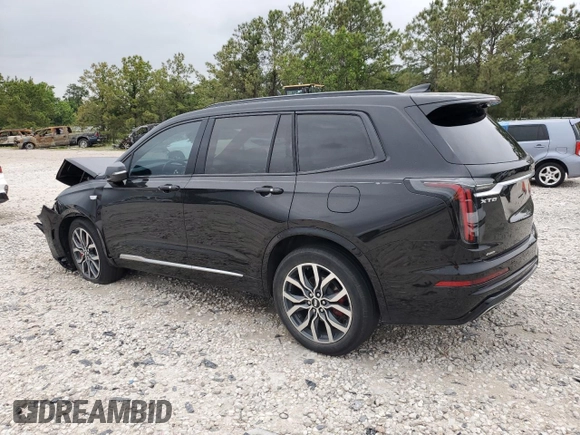 2023 Cadillac XT6 AWD Sport z VIN 1GYKPGRS6PZ126039, wystawiony jako Copart lot #55948605 z przebiegiem 39 966 mil mil oraz Szkoda całkowita • Salvage title. Historia ofert i sprzedaży dostępna na DreamBid. Obrazek 2.