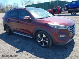 2018 Hyundai Tucson Value with VIN KM8J3CA21JU645467, listed as a IAAI auction lot 42022766 with 85,828 mi miles. Bid and sale history available at carsss.com. Image 1.