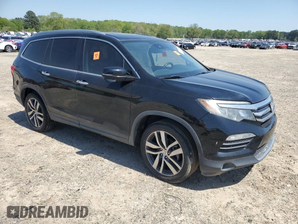 2018 Honda Pilot Touring with VIN 5FNYF6H93JB042446, listed as a Copart auction lot 52249195 with 111,044 mi miles and Salvage title. Bid and sale history available at DreamBid. Image 4.