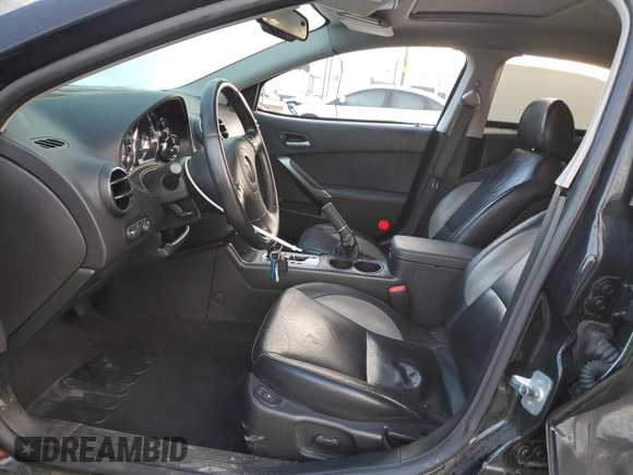2008 Pontiac G6 GXP with VIN 1G2ZM577084181587, listed as a Copart auction lot 82910964 with 54,630 mi miles and Salvage Title. Bid and sale history available at DreamBid. Image 7.