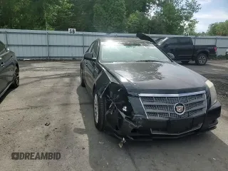 2011 Cadillac CTS Luxury z VIN 1G6DE5EY4B0102325, wystawiony jako Copart lot #57691775 z przebiegiem 157 711 mil mil oraz Szkoda całkowita • Salvage title. Historia ofert i sprzedaży dostępna na DreamBid. Obrazek 13.