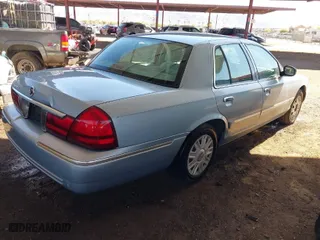 2004 Mercury Grand Marquis GS with VIN 2MEFM74W24X690149, listed as a IAAI auction lot 41842464 with 118,776 mi miles. Bid and sale history available at carsss.com. Image 4.