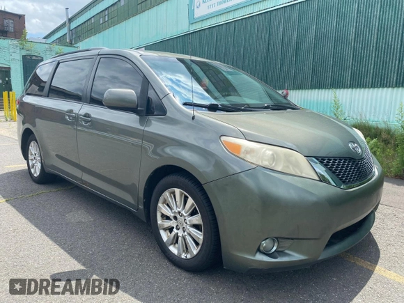 2011 Toyota Sienna XLE with VIN 5TDDK3DC3BS023855, listed as a Copart auction lot 65672825 with 280,540 mi miles and Clean title. Bid and sale history available at DreamBid. Image 1.