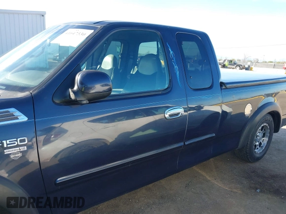 1999 Ford F-150 XL with VIN 1FTRX17L4XKA58054, listed as a IAAI auction lot 41647530 with 225,632 mi miles. Bid and sale history available at carsss.com. Image 14.