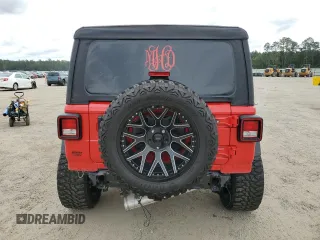 2023 Jeep Wrangler Sport with VIN 1C4HJXDG5PW527992, listed as a Copart auction lot 73312234 with 32,686 mi miles and Salvage Title. Bid and sale history available at DreamBid. Image 6.