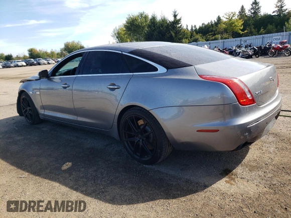 2011 Jaguar XJ with VIN SAJXA2GE5BMV13122, listed as a Copart auction lot 73113044 with 164,196 mi miles and Salvage Title. Bid and sale history available at DreamBid. Image 2.