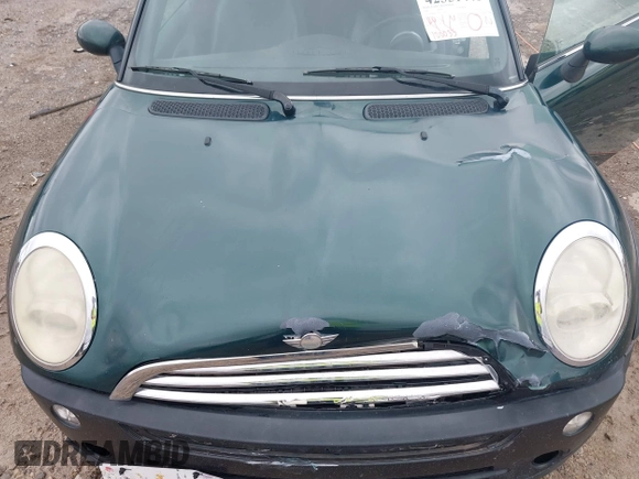 2005 MINI Convertible with VIN WMWRF33495TG11818, listed as a IAAI auction lot 42351446 with 100,033 mi miles and . Bid and sale history available at DreamBid. Image 10.