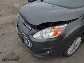 2015 Ford C-Max Energi SEL with VIN 1FADP5CU7FL121209, listed as a IAAI auction lot 41621034 with 145,648 mi miles. Bid and sale history available at carsss.com. Image 13.