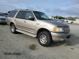 2001 Ford Expedition Eddie Bauer with VIN 1FMPU18L31LB70212, listed as a Copart auction lot 50969355 with 100,311 mi miles and Clean title. Bid and sale history available at DreamBid. Image 4.