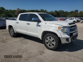 2016 Toyota Tundra 4WD Truck Platinum with VIN 5TFAW5F11GX570994, listed as a Copart auction lot 71259634 with 199,537 mi miles and Salvage Title. Bid and sale history available at carsss.com. Image 4.