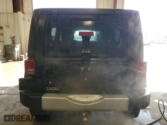 2008 Jeep Wrangler Unlimited Sahara with VIN 1J4GA59198L623643, listed as a Copart auction lot 50590485 with 198,000 mi miles and Non Repairable. Bid and sale history available at carsss.com. Image 6.